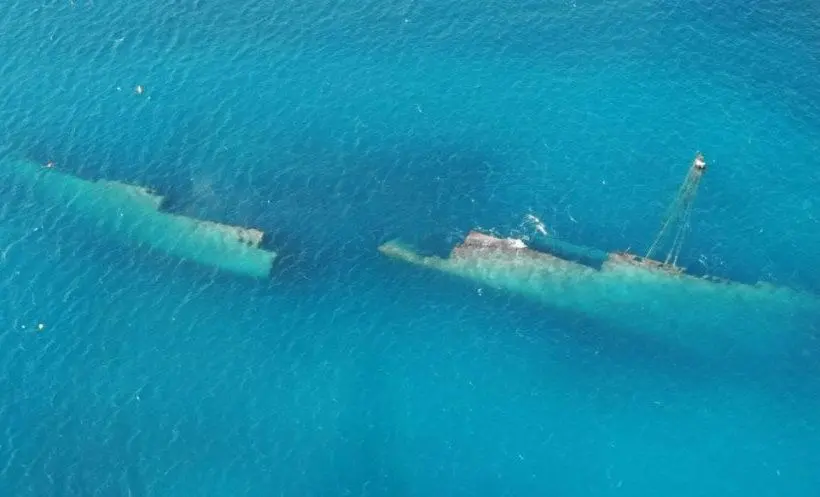 Aerial view of the SS Antilla shipwreck resting in Aruba's turquoise water