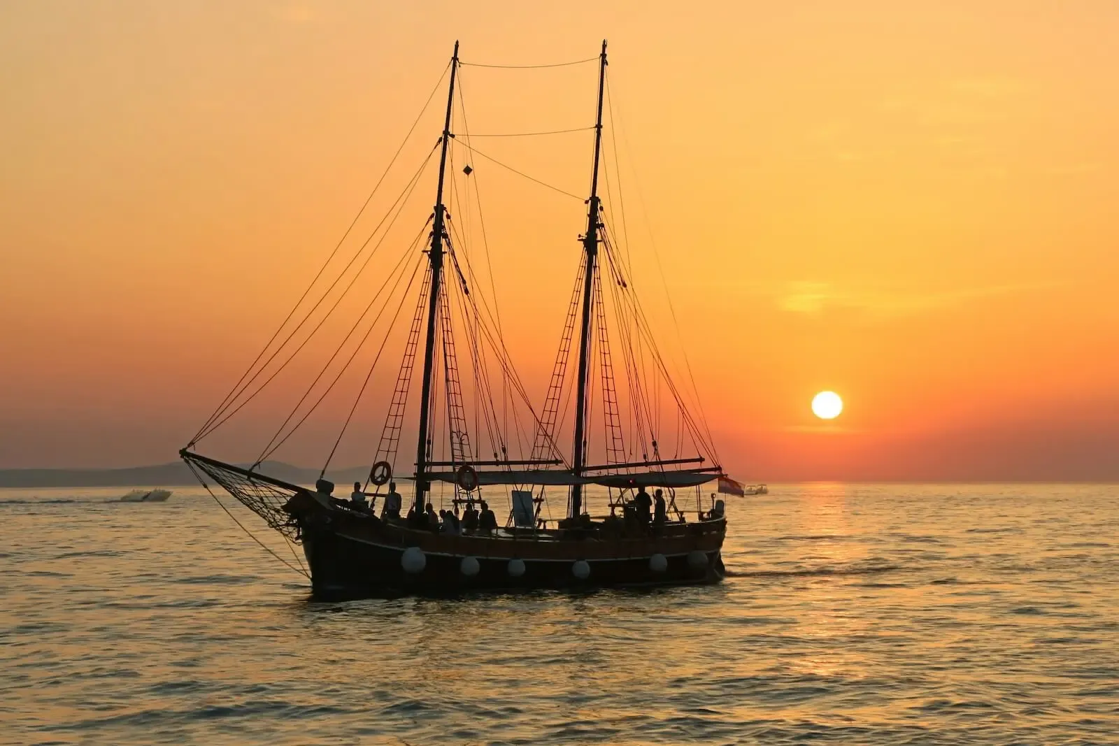 Guests aboard the schooner at sunset